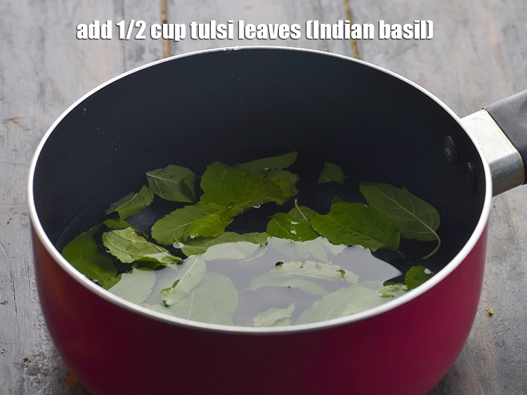 Step 8 – <p>તુલસીના પાન ઉમેરો. Add the tulsi leaves.</p>