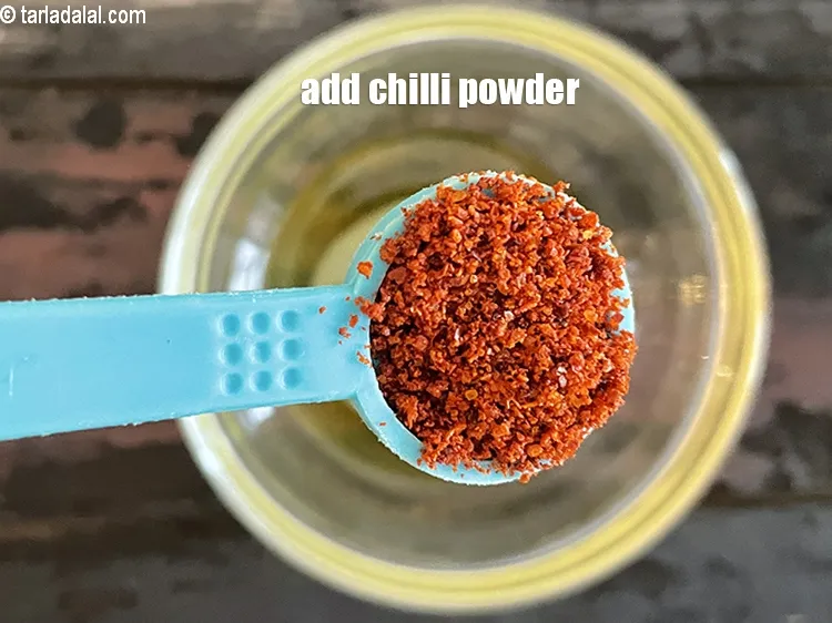 Step 12 – <p>૧/૨ ટીસ્પૂન મરચું પાવડર ઉમેરો. Add&nbsp;1/2 tsp chilli powder.</p>