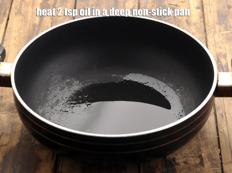 Step 17 – <p><span style="background-color:rgb(255,255,255);color:rgb(0,0,0);">બાજરાના આખા મગની ખીચડીને ધીમા તાપે શેકવા માટે, એક ઊંડા નોન-સ્ટીક પેનમાં તેલ ગરમ …