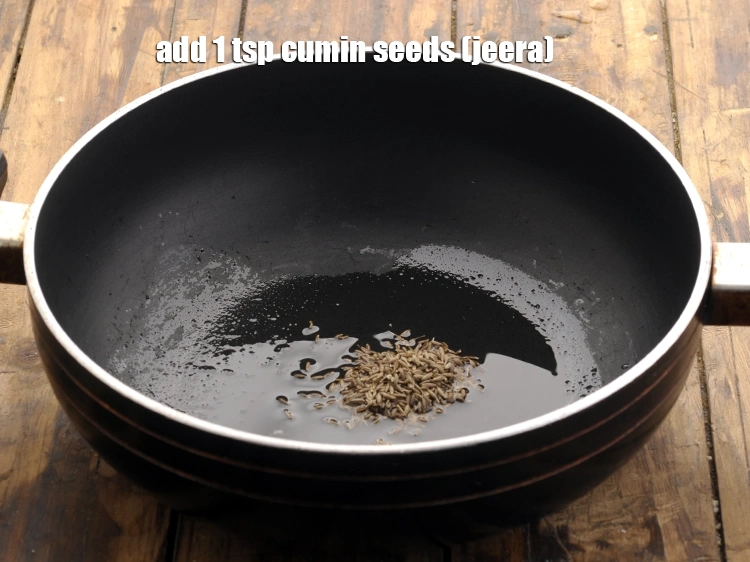 Step 18 – <p><span style="background-color:rgb(255,255,255);color:rgb(0,0,0);">તેલ ગરમ થાય એટલે તેમાં જીરું ઉમેરો. Once the oil is hot, add the …
