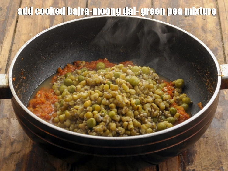 Step 30 – <p><span style="background-color:rgb(255,255,255);color:rgb(0,0,0);">બાફેલી બાજરી-મૂંગ દાળ-લીલા વટાણાનું મિશ્રણ ઉમેરો. Add the cooked bajra-moong dal- green pea mixture.</span></p>