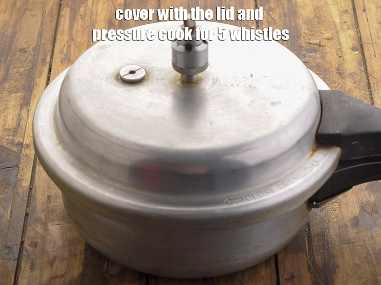 Step 15 – <p><span style="background-color:rgb(255,255,255);color:rgb(0,0,0);">ઢાંકણ ઢાંકીને ૫ સીટી વગાડો. ઢાંકણ ખોલતા પહેલા વરાળ નીકળવા દો. Cover with the …