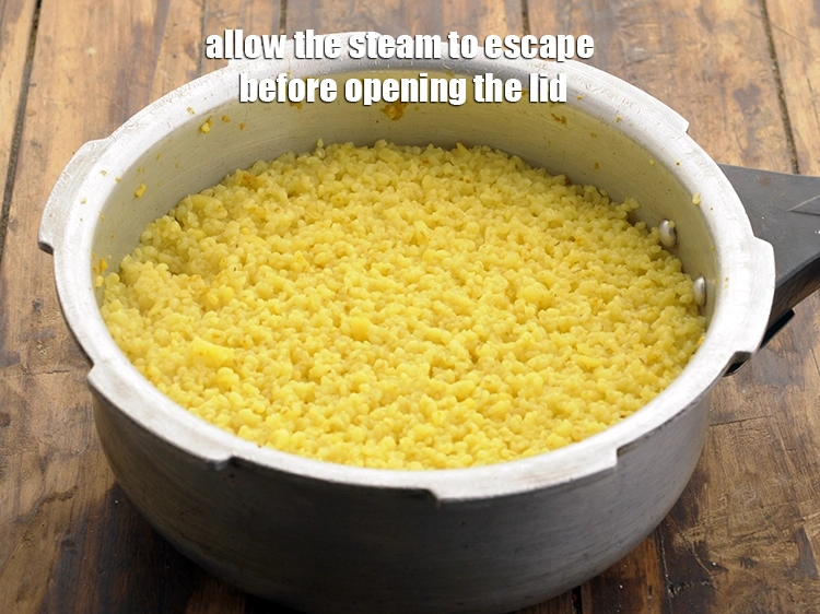 Step 12 – <p>ઢાંકણ ખોલતા પહેલા વરાળ બહાર નીકળવા દો. બાજુ પર રાખો. Allow the steam to escape …