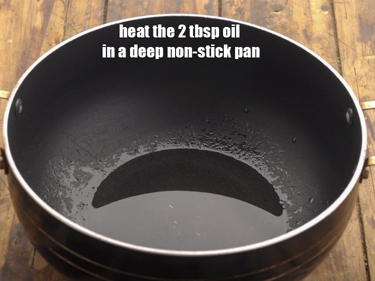 Step 13 – <p>એક ઊંડા નોન-સ્ટીક પેનમાં તેલ ગરમ કરો.. Heat the oil in a deep non-stick pan.</p>