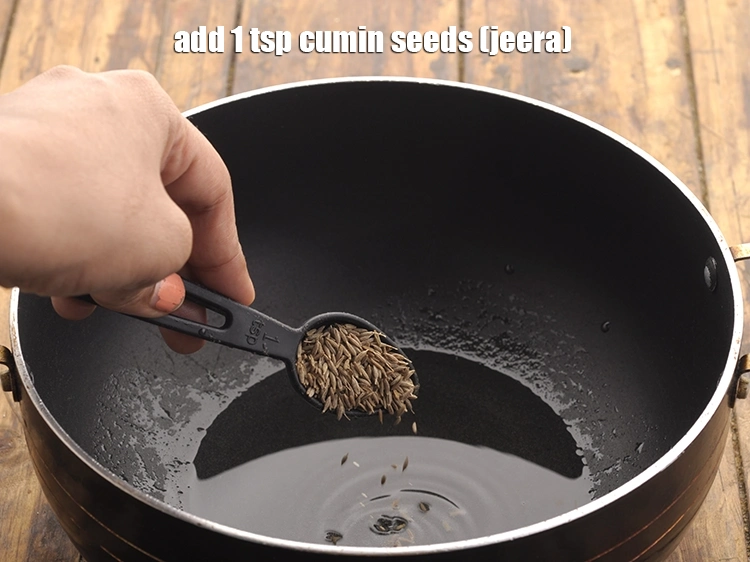 Step 14 – <p><span style="background-color:rgb(255,255,255);color:rgb(0,0,0);">જીરું ઉમેરો. Add the cumin seeds</span></p>