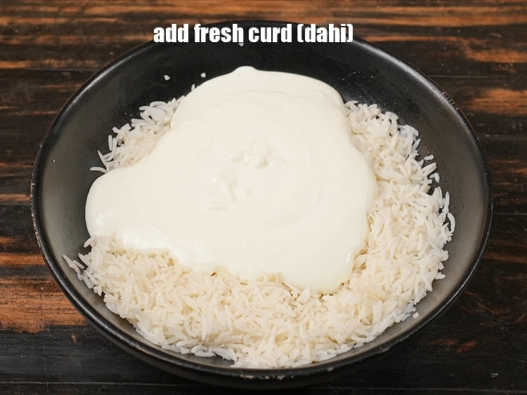 Step 6 – <p>૨ કપ તાજું દહીં (દહીં) ઉમેરો. ઘરે બનાવેલું દહીં બનાવવા માટે તમે સ્ટેપ બાય સ્ટેપ …