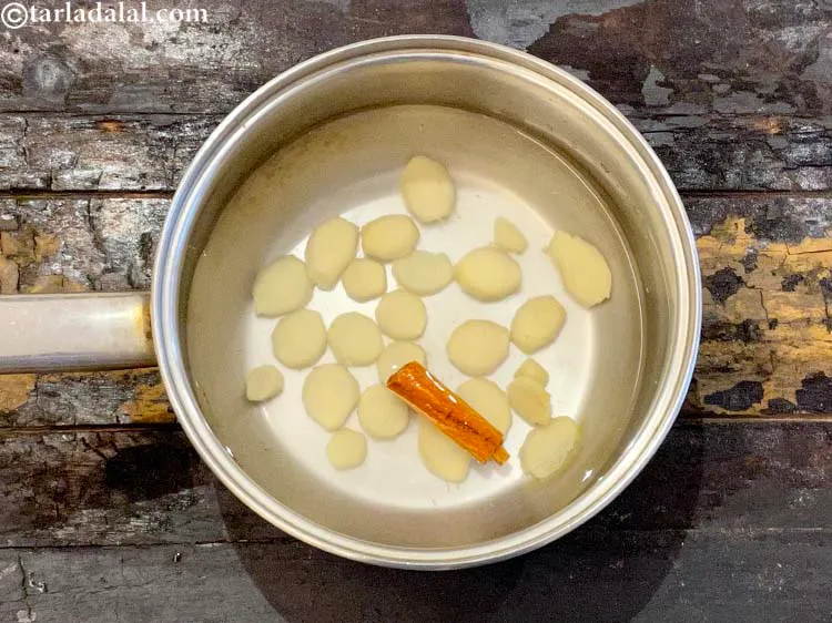 Step 8 – <p>2 કપ પાણી ઉમેરો. Add 2 cups of water.</p>