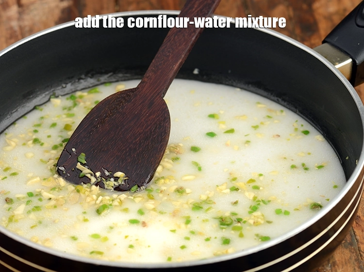 Step 14 – <p>તેમાં કોર્નફ્લોર-પાણીનું મિશ્રણ ઉમેરો.</p>