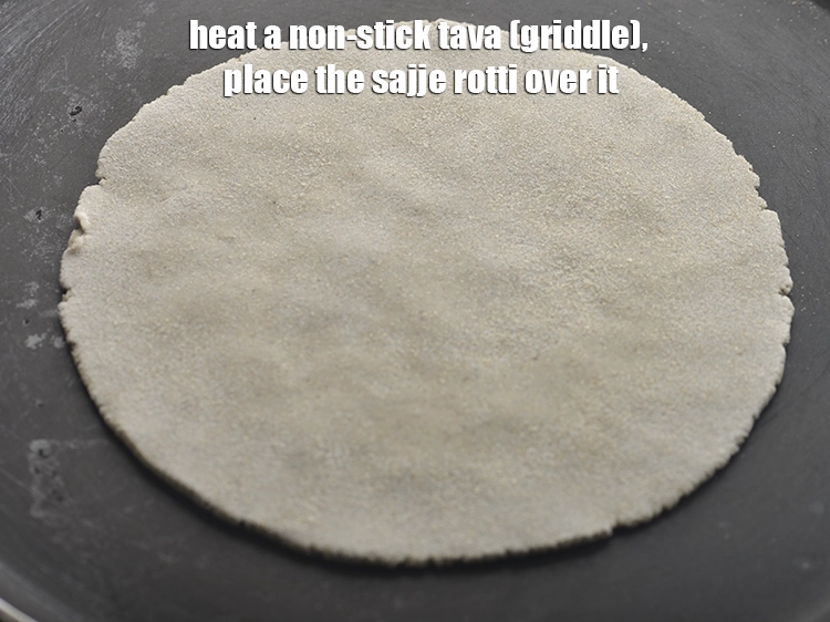 Step 11 – <p>એક નોન-સ્ટીક તવા (ગ્રીડલ) ગરમ કરો, તેના પર સજ્જે રોટલી મૂકો. Heat a non-stick tava …