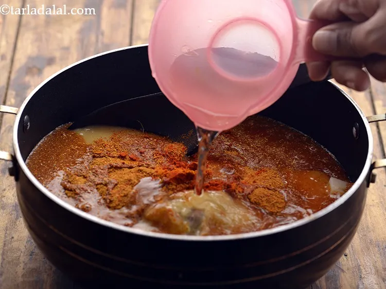 Step 58 – <p>¾ કપ પાણી ઉમેરો. તમારી ઇચ્છા મુજબ પાણી ઉમેરી શકો છો. Add ¾ cup of …