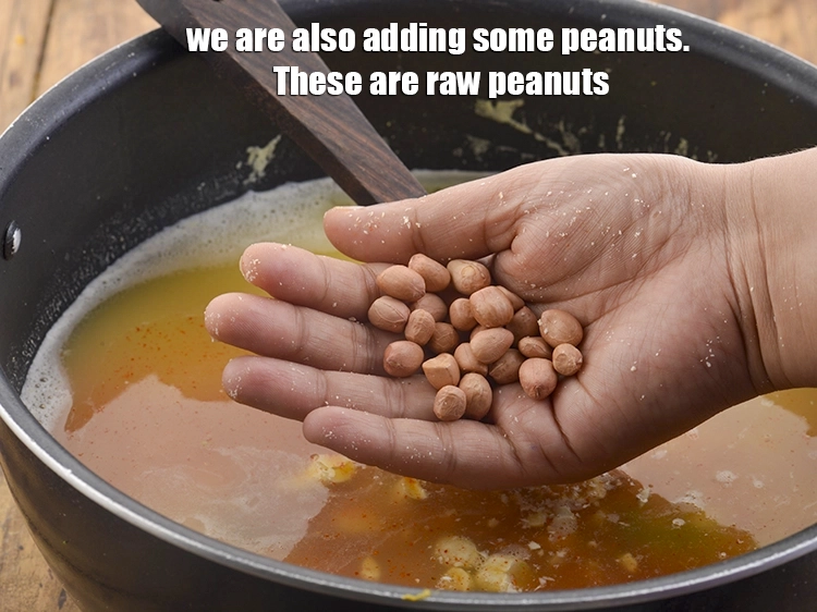 Step 34 – <p>અમે થોડી મગફળી પણ ઉમેરી રહ્યા છીએ. આ કાચી મગફળી છે.</p>
