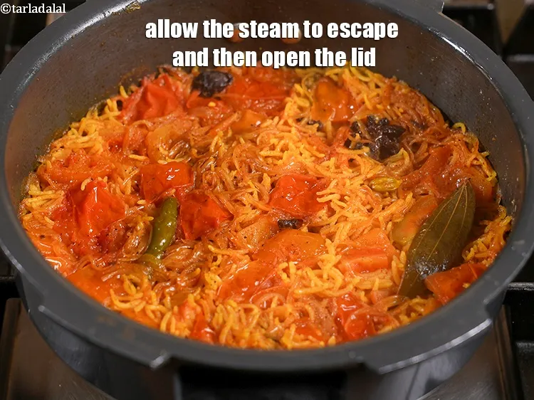 Step 25 – <p>વરાળ નીકળવા દો અને પછી ઢાંકણ ખોલો.</p>