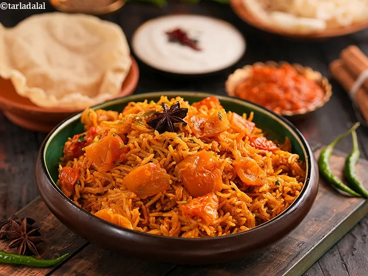 Step 27 – <p>સંપૂર્ણ ભોજન માટે રાયતા, પાપડ અથવા અથાણા સાથે <strong>ટામેટા ભાત</strong> પીરસો.</p>