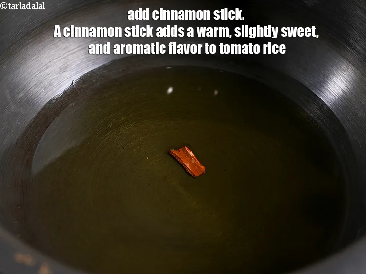 Step 3 – <p><span style="background-color:rgb(255,255,255);color:rgb(0,0,0);">1 </span><a href="https://www.tarladalal.com/glossary-cinnamon-dalchini-gujarati-346i"><u>તજ (cinnamon, dalchini) </u></a><span style="background-color:rgb(255,255,255);color:rgb(0,0,0);">સ્ટીક</span> ઉમેરો. તજ ટામેટા ભાતમાં ગરમ, થોડી મીઠી …