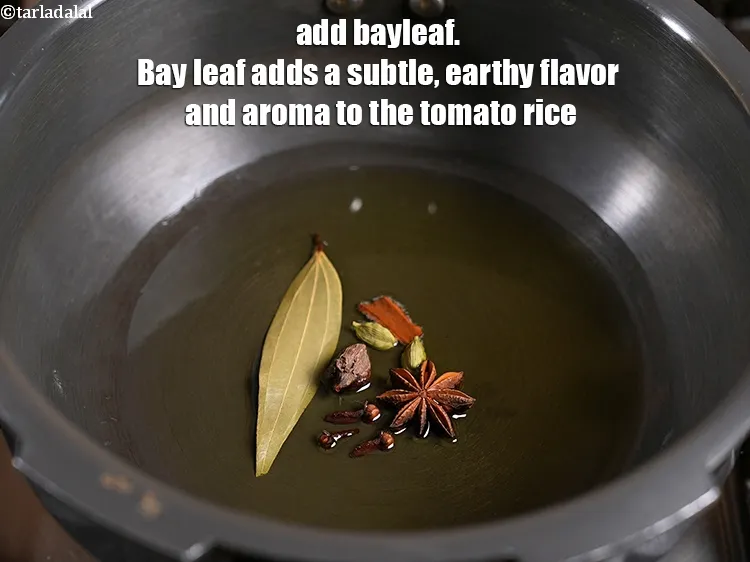 Step 8 – <p><span style="background-color:rgb(255,255,255);color:rgb(0,0,0);">1 </span><a href="https://www.tarladalal.com/glossary-bay-leaf-tejpatta-bay-leaves-gujarati-189i"><u>તમાલપત્ર (bay leaf (tejpatta)</u></a> પત્ર ઉમેરો. તમાલપત્ર ટામેટાના ભાતમાં સૂક્ષ્મ, માટીનો સ્વાદ …