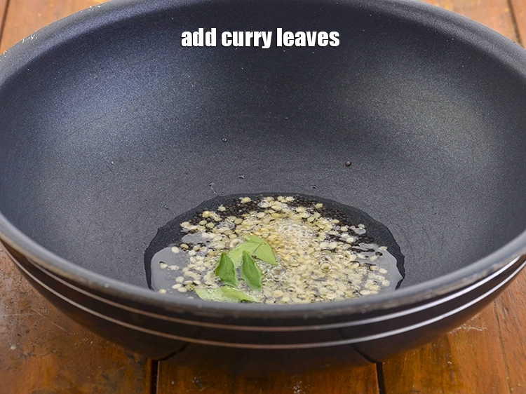 Step 7 – <p>આગળ, કઢી પત્તા ઉમેરો.</p>