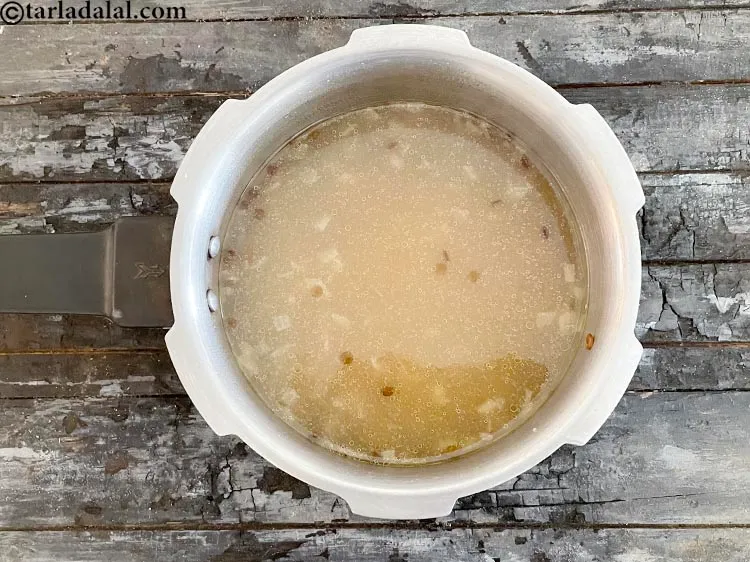 Step 21 – <p>ઢાંકણ ખોલતા પહેલા વરાળ બહાર નીકળવા દો. સૂપ આવો દેખાય છે.</p>