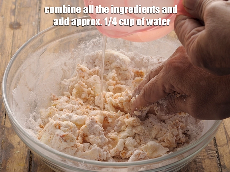Step 7 – <p>બધી સામગ્રી ભેગી કરો અને લગભગ ૧/૪ કપ પાણી ઉમેરો</p>