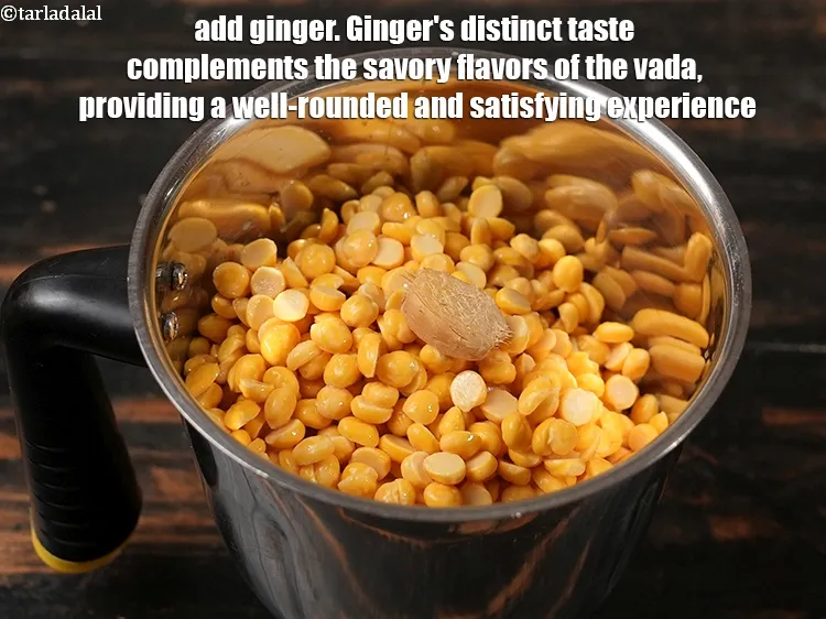 Step 2 – <p><span style="background-color:rgb(255,255,255);color:rgb(0,0,0);">૧ ઇંચ </span><a href="https://www.tarladalal.com/glossary-ginger-adrak-gujarati-453i"><u>આદુ (ginger, adrak)</u></a> ઉમેરો. આદુનો વિશિષ્ટ સ્વાદ વડાના સ્વાદિષ્ટ સ્વાદને પૂરક …