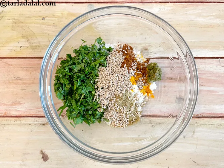 Step 12 – <p><span style="background-color:rgb(255,255,255);color:rgb(0,0,0);">2 ટેબલસ્પૂન </span><a href="https://www.tarladalal.com/glossary-sesame-seeds-til-gingelly-seeds-gujarati-612i"><u>તલ (sesame seeds, til)</u></a> ઉમેરો.</p>