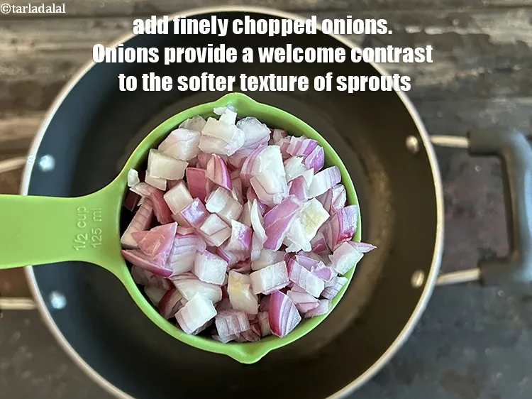 Step 3 – <p><span style="background-color:rgb(255,255,255);color:rgb(0,0,0);">1/2 કપ </span><a href="https://www.tarladalal.com/glossary-onions-pyaz-pyaaz-kanda-gujarati-548i#ing_2327"><u>સમારેલા કાંદા (chopped onions)</u></a> ઉમેરો. ડુંગળી સ્પ્રાઉટ્સની નરમ રચનામાં સ્વાગત કોન્ટ્રાસ્ટ …