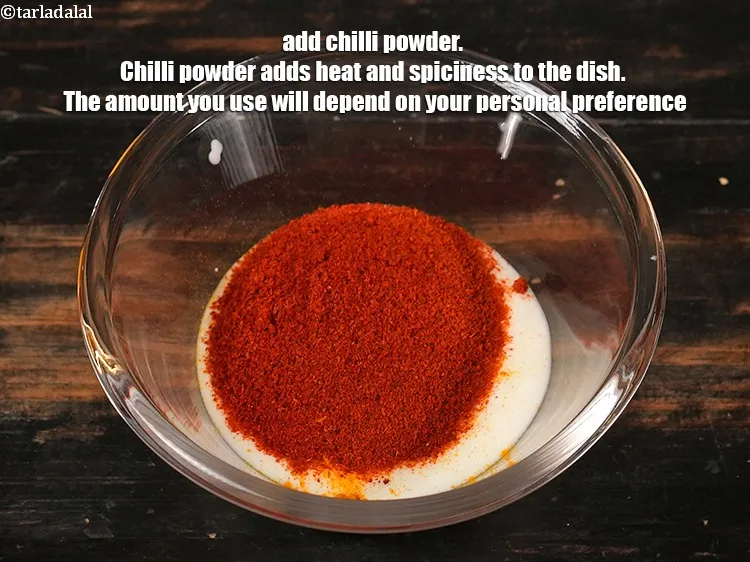 Step 3 – <p><span style="background-color:rgb(255,255,255);color:rgb(0,0,0);">2 ટીસ્પૂન </span><a href="https://www.tarladalal.com/glossary-chilli-powder-red-chilli-powder-gujarati-339i"><u>લાલ મરચાંનો પાવડર (red chilli powder)</u></a></p>