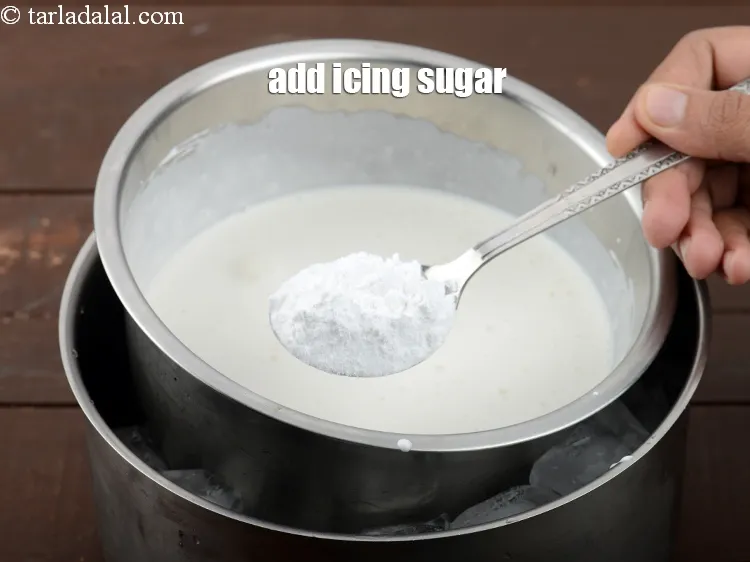 Step 11 – <p>2 <span style="background-color:rgb(255,255,255);color:rgb(0,0,0);">ટેબલસ્પૂન</span> આઈસિંગ સુગર ઉમેરો.</p>