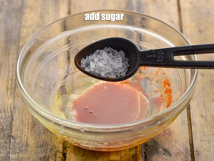 Step 6 – <p>છેલ્લે, થોડી <a href="https://www.tarladalal.com/glossary-sugar-chini-shakkar-gujarati-278i"><u>સાકર (sugar)</u></a> ઉમેરો. સાકરને મધ સાથે બદલી શકાય છે.</p>