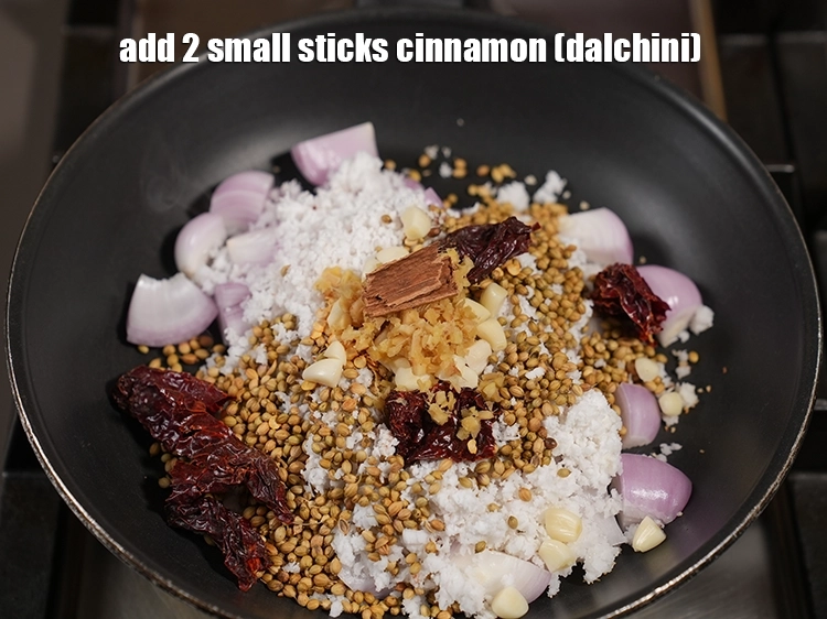 Step 9 – <p><span style="background-color:rgb(255,255,255);color:rgb(0,0,0);">૨ નાની </span><a href="https://www.tarladalal.com/glossary-cinnamon-dalchini-gujarati-346i"><u>તજ (cinnamon, dalchini)</u></a><span style="background-color:rgb(255,255,255);color:rgb(0,0,0);"> ઉમેરો.</span></p>