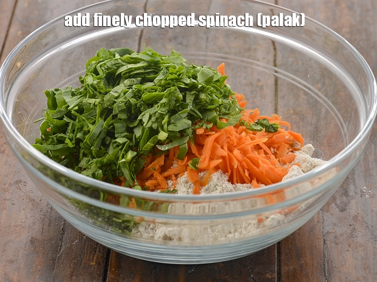 Step 5 – <p><span style="background-color:rgb(255,255,255);color:rgb(0,0,0);">1/2 કપ </span><a href="https://www.tarladalal.com/glossary-spinach-palak-gujarati-255i#ing_2362"><u>સમારેલી પાલક (chopped spinach)</u></a> ઉમેરો. પાલકમાં ડાયેટરી ફાઇબર ભરપૂર હોય છે, …