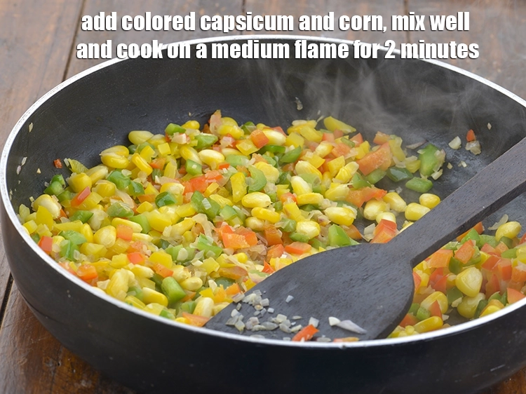 Step 4 – <p>૧ ૧/૨ કપ <a href="https://www.tarladalal.com/glossary-coloured-capsicum-coloured-bell-pepper-gujarati-2798i">સમારેલા રંગીન કેપ્સિકમ</a> અને ૧/૨ કપ <a href="https://www.tarladalal.com/glossary-sweet-corn-kernels-makai-ke-dane-gujarati-156i">બાફેલા સ્વીટ કોર્નના દાણા …