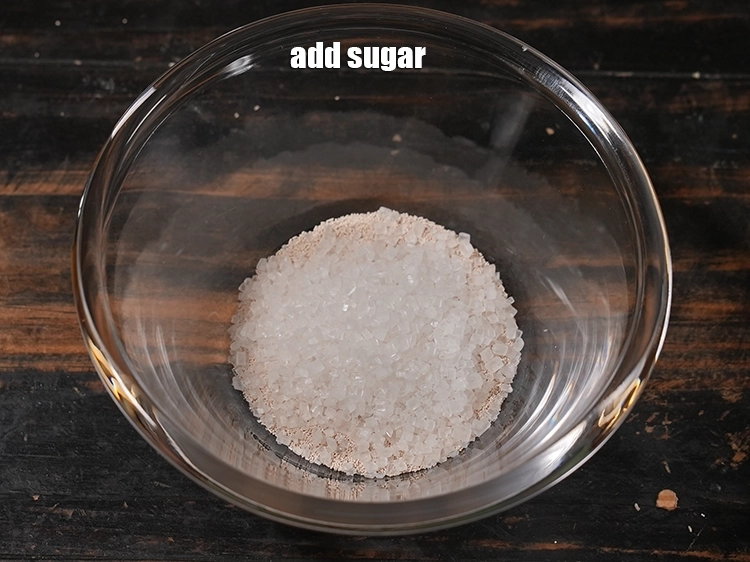 Step 2 – <p>૨ ચમચી <a href="https://www.tarladalal.com/glossary-sugar-chini-shakkar-gujarati-278i"><u>સાકર (sugar)</u></a> ઉમેરો.</p>