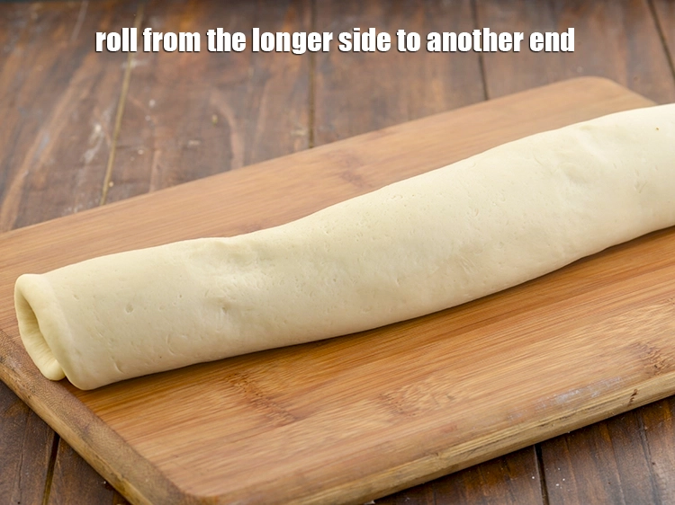 Step 25 – <p>લાંબી બાજુથી બીજા છેડા સુધી ફેરવો.</p>