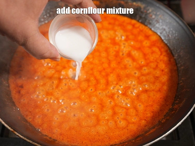 Step 33 – <p>૧ ચમચી પાણીમાં ઓગાળીને ૧/૨ ચમચી <a href="https://www.tarladalal.com/glossary-cornflour-cornstarch-maize-starch-corn-flour-gujarati-112i"><u>કોર્નફલોર (cornflour)</u></a> ઉમેરો.</p>