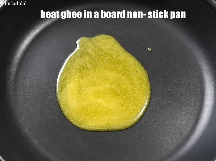 Step 10 – <p>એક બોર્ડ નોન-સ્ટીક પેનમાં ૧ <span style="background-color:rgb(255,255,255);color:rgb(0,0,0);">ટેબલસ્પૂન </span><a href="https://www.tarladalal.com/glossary-ghee-gujarati-245i"><u>ઘી (ghee)</u></a> ગરમ કરો.</p>