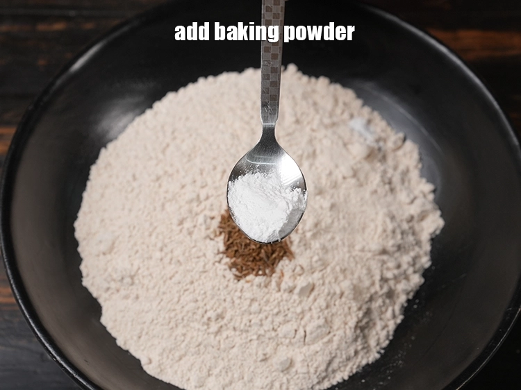 Step 4 – <p>૧/૨ ચમચી <a href="https://www.tarladalal.com/glossary-baking-powder-gujarati-425i">બેકિંગ પાવડર</a> ઉમેરો.</p>