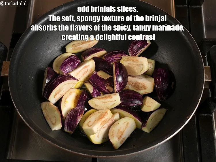 Step 17 – <p>3<span style="background-color:rgb(255,255,255);color:rgb(0,0,0);"> કપ </span><a href="https://www.tarladalal.com/glossary-brinjal-baingan-eggplant-aubergine-gujarati-128i#ing_2304"><u>સ્લાઇસ કરેલા રીંગણ (sliced brinjals )</u></a> ઉમેરો. રીંગણની નરમ, સ્પોન્જી રચના …