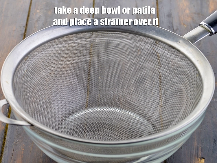 Step 2 – <p>પહેલું પગલું એ છે કે એક ઊંડો બાઉલ અથવા તપેલી લો અને તેના પર સ્ટ્રેનર …