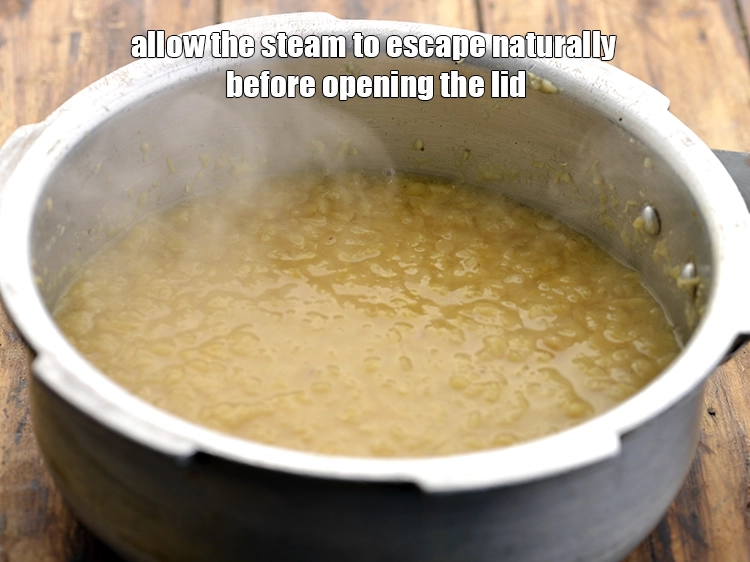 Step 12 – <p style="margin-left:0px;">ઢાંકણ ખોલતા પહેલા વરાળ કુદરતી રીતે બહાર નીકળવા દો.</p>