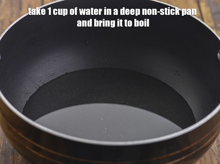 Step 15 – <p><span style="background-color:rgb(255,255,255);color:rgb(0,0,0);">ઊંડા નોન-સ્ટીક પેનમાં 1 કપ પાણી લો અને તેને ઉકાળો.</span></p>