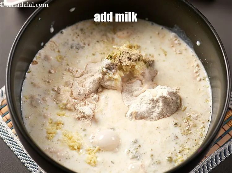 Step 13 – <p><span style="background-color:rgb(255,255,255);color:rgb(0,0,0);">1 કપ </span><a href="https://www.tarladalal.com/glossary-milk-doodh-full-cream-milk-gujarati-514i"><u>દૂધ (milk)</u></a> ઉમેરો.</p>
