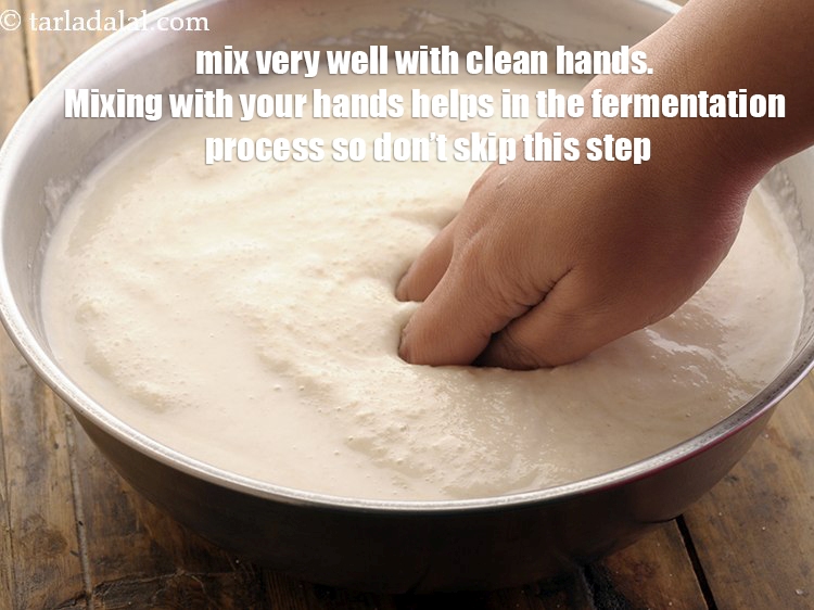 Step 22 – <p>સ્વચ્છ હાથથી ખૂબ સારી રીતે મિક્સ કરો. હાથથી મિક્સ કરવાથી આથો પ્રક્રિયામાં મદદ મળે છે …