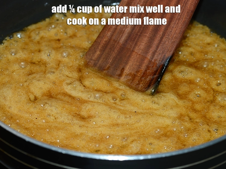 Step 2 – <p>¼ કપ <strong>પાણી</strong> ઉમેરો અને સારી રીતે મિક્સ કરો અને મધ્યમ તાપ પર રાંધો.</p>