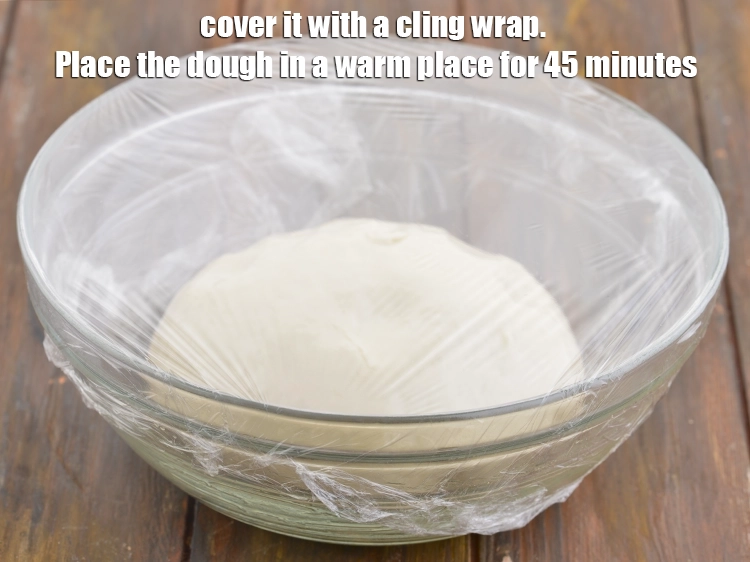 Step 5 – <p><span style="background-color:rgb(255,255,255);color:rgb(0,0,0);">બાઉલ પર ક્લીંગ રૅપ (cling wrap) વીંટાળી મજબૂત રીતે બંધ કરી લો. આ કણિકને …