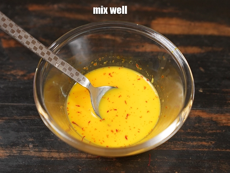Step 11 – <p>સારી રીતે મિક્સ કરો. કેસરવાળા દૂધનું મિશ્રણ બાજુ પર રાખો. કેસરને ઓછામાં ઓછા 20 મિનિટ …