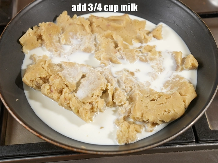 Step 15 – <p><span style="background-color:rgb(255,255,255);color:rgb(0,0,0);">3/4 કપ </span><a href="https://www.tarladalal.com/glossary-milk-doodh-full-cream-milk-gujarati-514i"><u>દૂધ (milk)</u></a> ઉમેરો.</p>