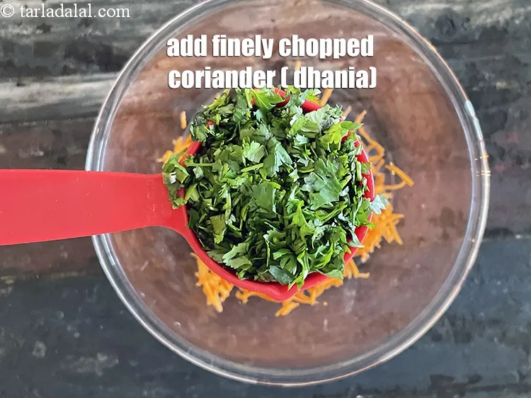 Step 2 – <p><span style="background-color:rgb(255,255,255);color:rgb(0,0,0);">1/4 કપ </span><a href="https://www.tarladalal.com/glossary-coriander-dhania-kothmir-gujarati-369i#ing_3500"><u>બારીક સમારેલી કોથમીર (finely chopped coriander)</u></a> ઉમેરો.</p>