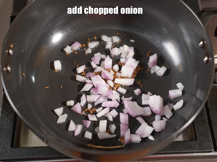 Step 12 – <p><span style="background-color:rgb(255,255,255);color:rgb(0,0,0);">1/4 કપ </span><a href="https://www.tarladalal.com/glossary-onions-pyaz-pyaaz-kanda-gujarati-548i#ing_2327"><u>સમારેલા કાંદા (chopped onions)</u></a> ઉમેરો. દાળ રાંધવાની શરૂઆતમાં ડુંગળીને ઘણીવાર સાંતળવામાં …