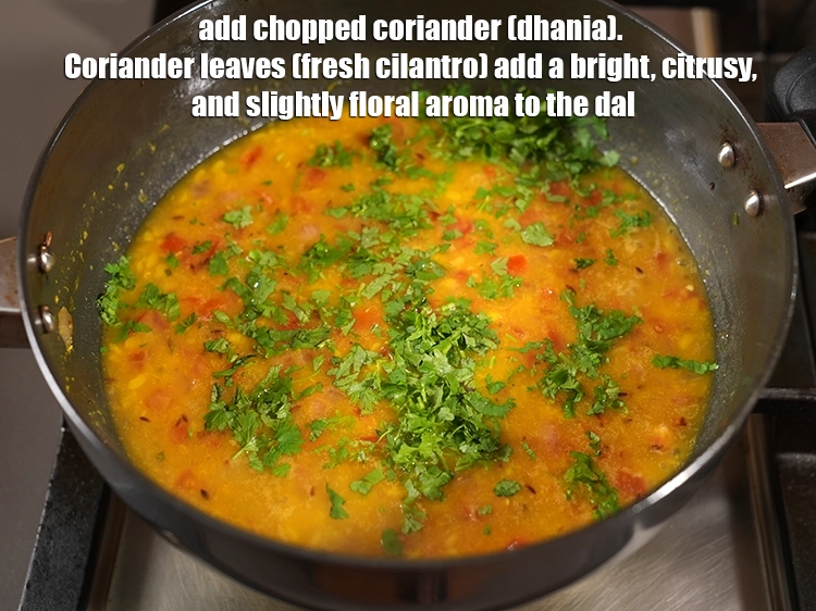 Step 21 – <p><span style="background-color:rgb(255,255,255);color:rgb(0,0,0);">2 ટેબલસ્પૂન </span><a href="https://www.tarladalal.com/glossary-coriander-dhania-kothmir-gujarati-369i#ing_2365"><u>સમારેલી કોથમીર (chopped coriander)</u></a> ઉમેરો. ધાણાના પાન (તાજા કોથમીર) દાળમાં તેજસ્વી, …