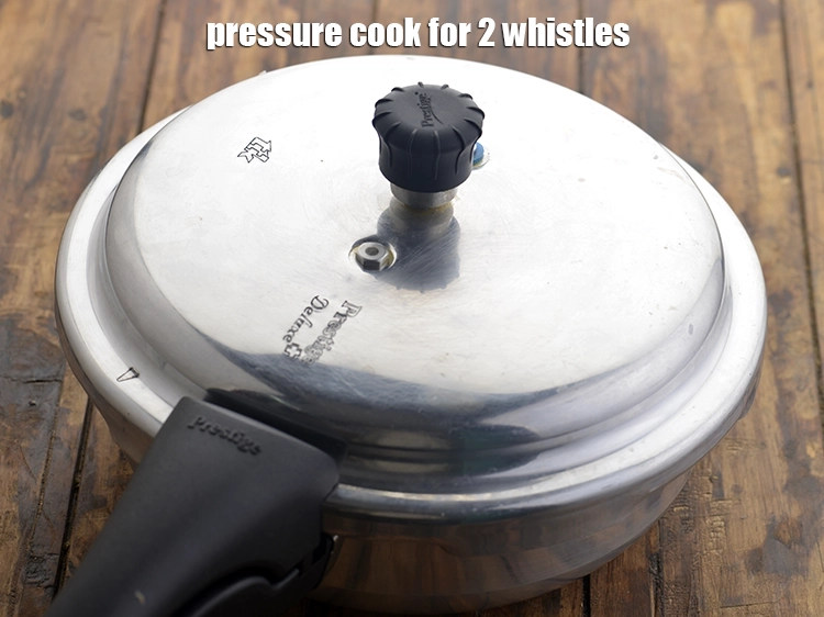 Step 8 – <p>૨ સીટી સુધી પ્રેશર કુક કરો.</p>
